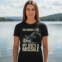 Load image into Gallery viewer, Woman wearing a black t-shirt with a graphic and text by a lake